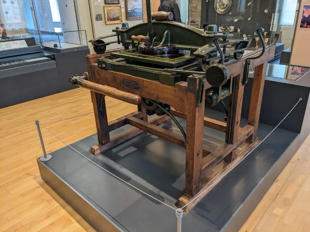 Press used by James Chalmers in the production of the first postage stamp, on display at the McManus in Dundee